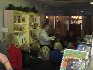 John reading from Locked in